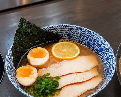 Shio ramen with egg, lemon and chicken